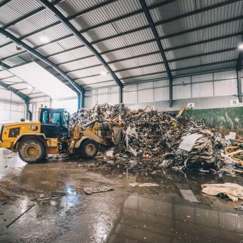 Sorting waste with CAT vehicle - CSH Environmental