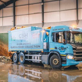 Side view of CSH Environmental glass and food collection vehicle