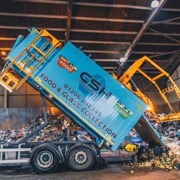 Emptying food waste inside CSH Environmental's yard in Colchester, Essex